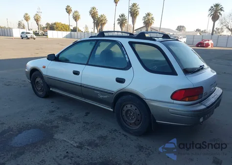 1999 Subaru Impreza Outback Sport from USA, damaged, VIN JF1GF4853XG800951